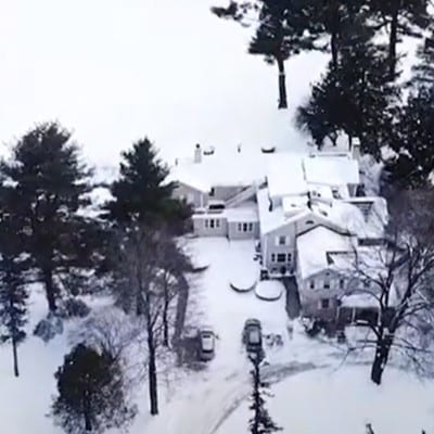 the Inn covered in White Snow